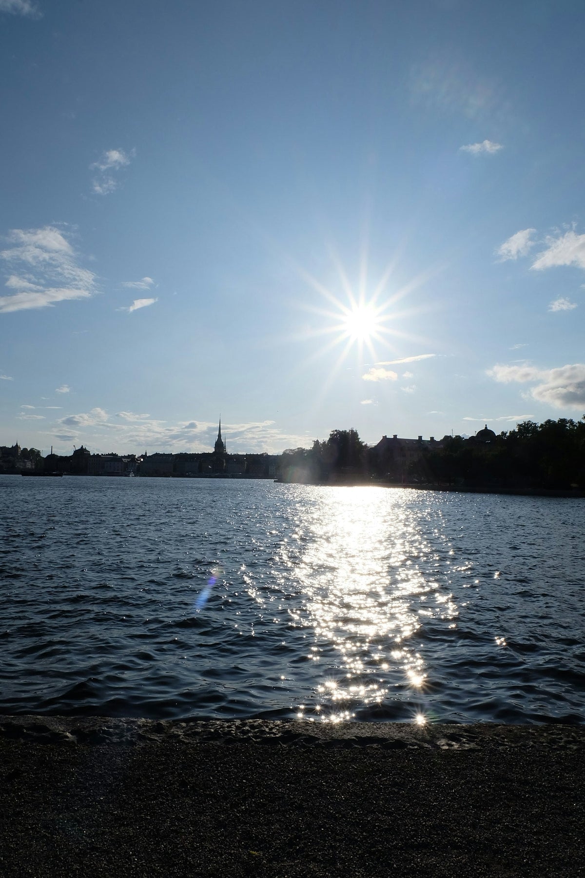 Sunlight on the water in Stockholm, Sweden, representing the country's reputation for pristine lakes and tap water