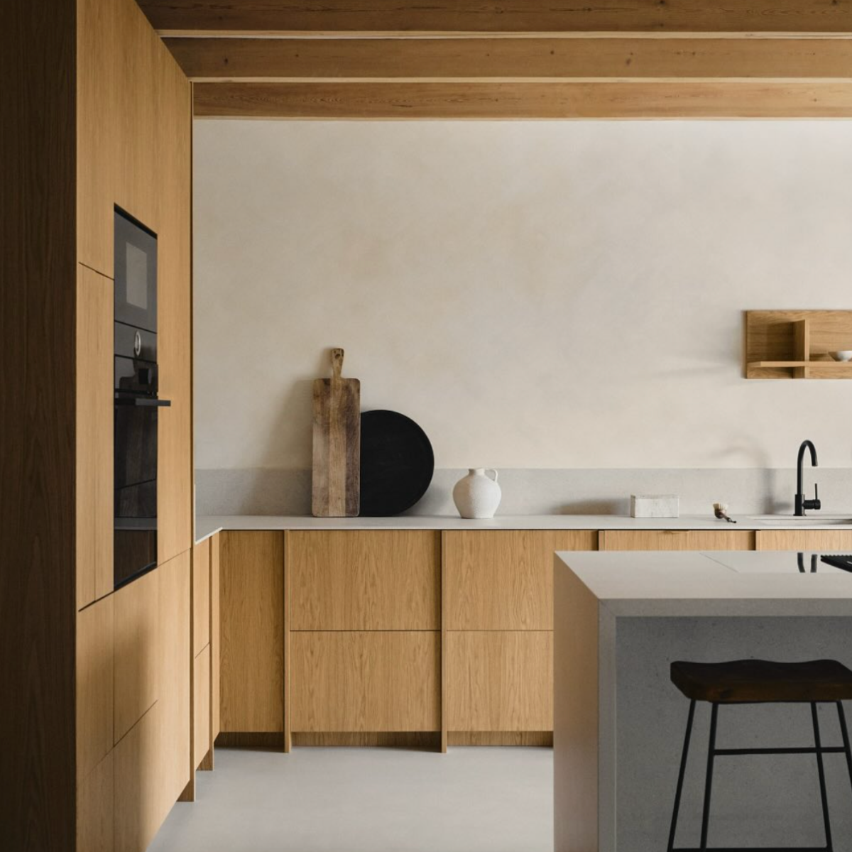 Modern kitchen with wooden cabinets and a white countertop