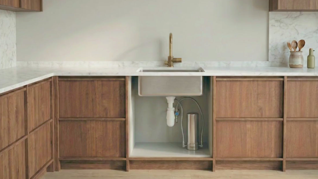 PJURE under-sink water filter installed in a modern kitchen