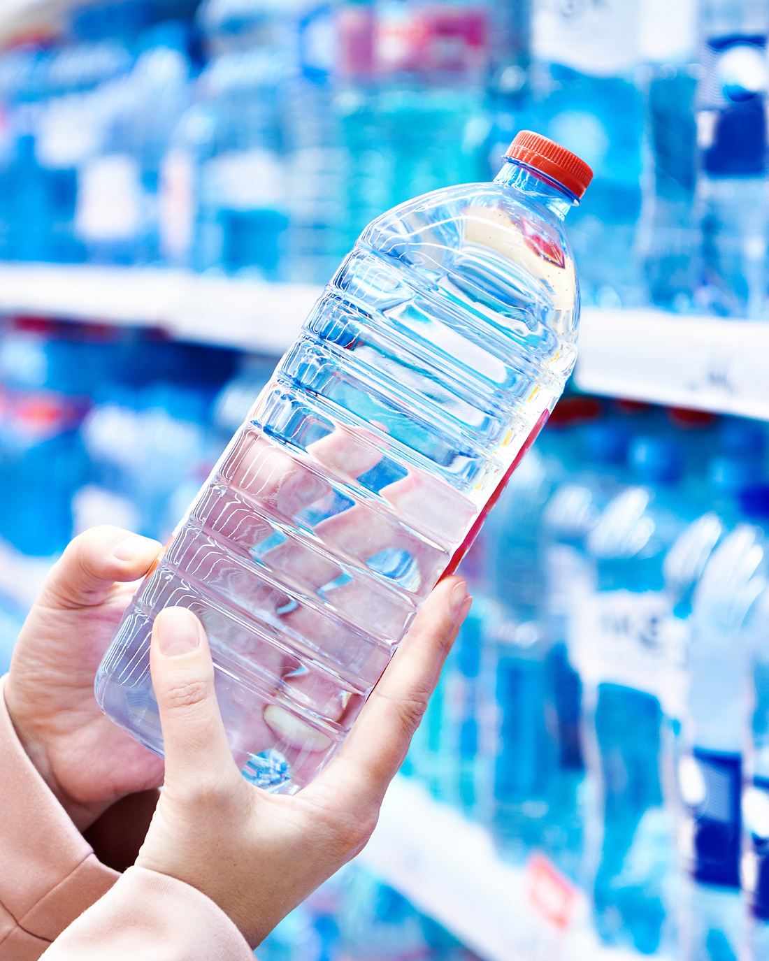 Cost comparison between bottled water and filtered tap water in Europe showing long term savings with an under sink water filter