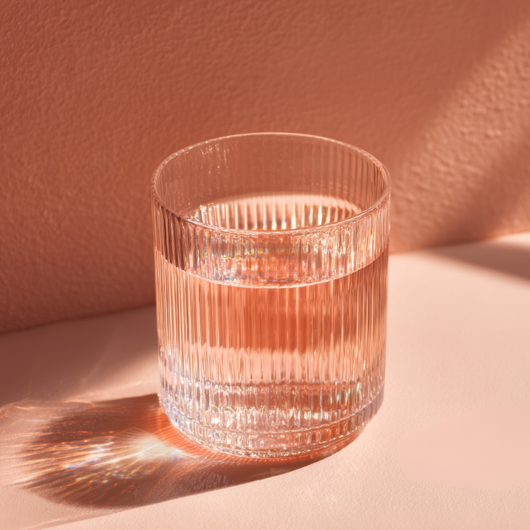 Clear glass with water illustrating the science behind water filtration